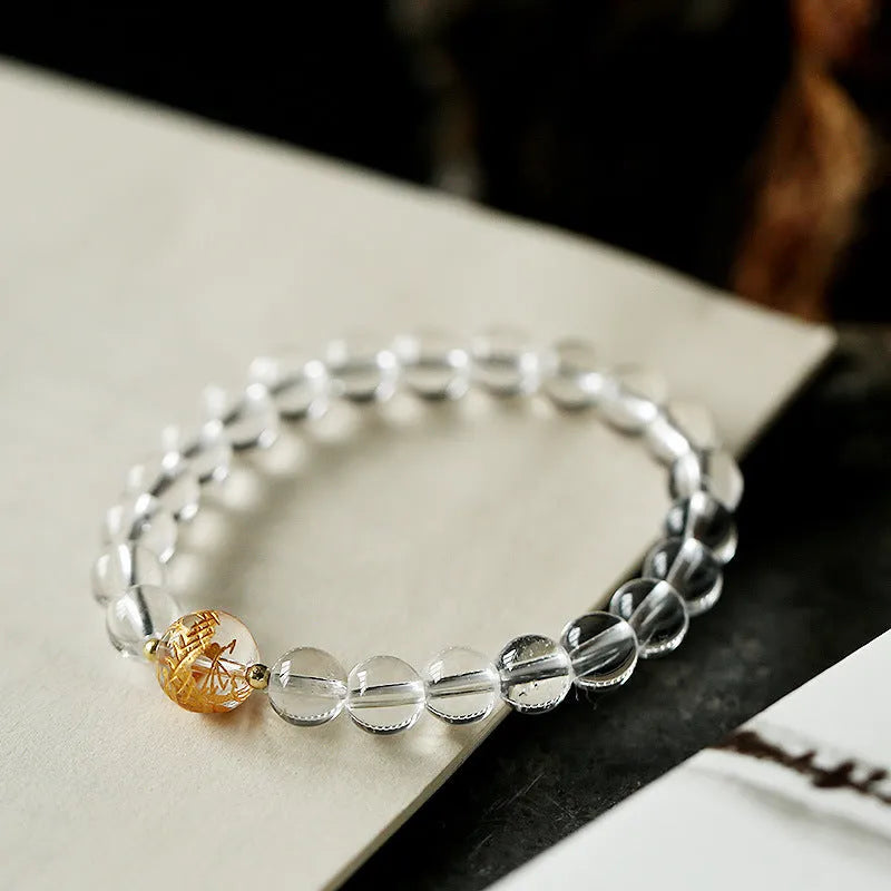 Unisex geometric obsidian and white crystal bracelet with black agate beads and golden dragon accent