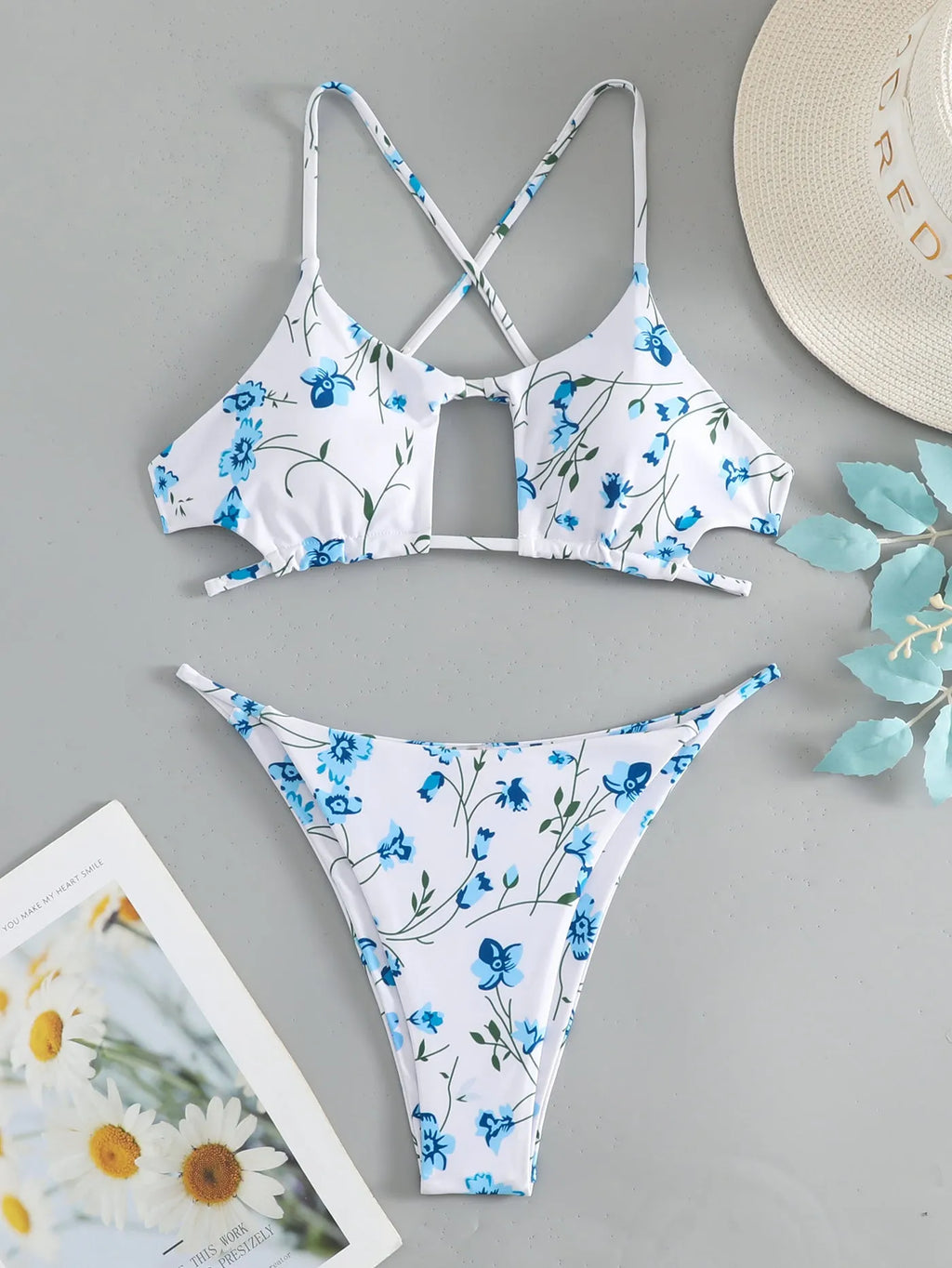 Women's floral patterned tie-neck triangle bikini top with matching shorts swimwear set