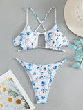Women's floral patterned tie-neck triangle bikini top with matching shorts swimwear set