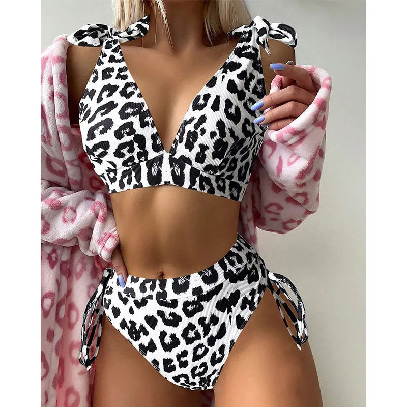 Women's purple leopard print swimsuit with lace-up chest detail and high-waist shorts