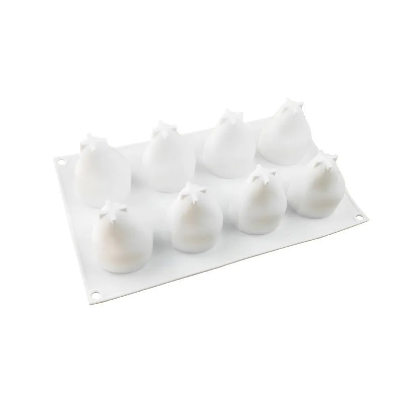 Silicone baking mould with six fruit-shaped cavities including pineapple and pine cone designs for Italian mousse