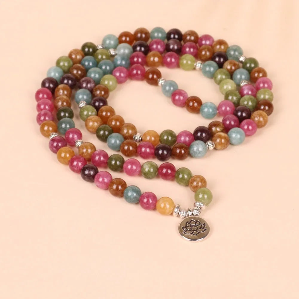 108-bead multi-layer bracelet with alloy construction, tourmaline colour, and lotus hanging pendant on wrist