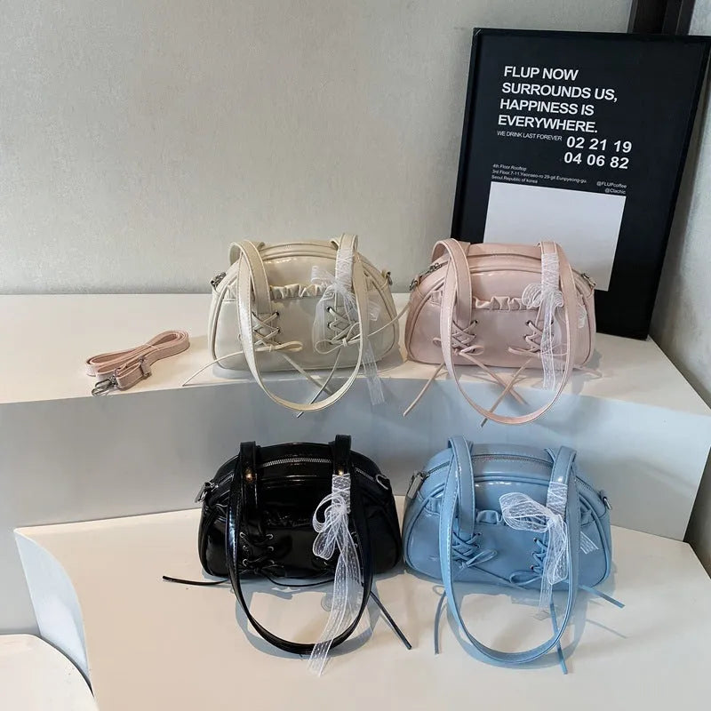 Women's bandage bow handbag in PU leather with mobile phone compartment and decorative sewing thread details