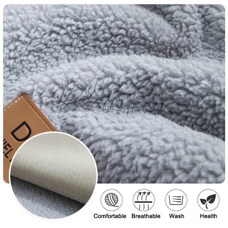 Beige plush sofa cover with anti-slip backing draped over a living room sofa cushion.