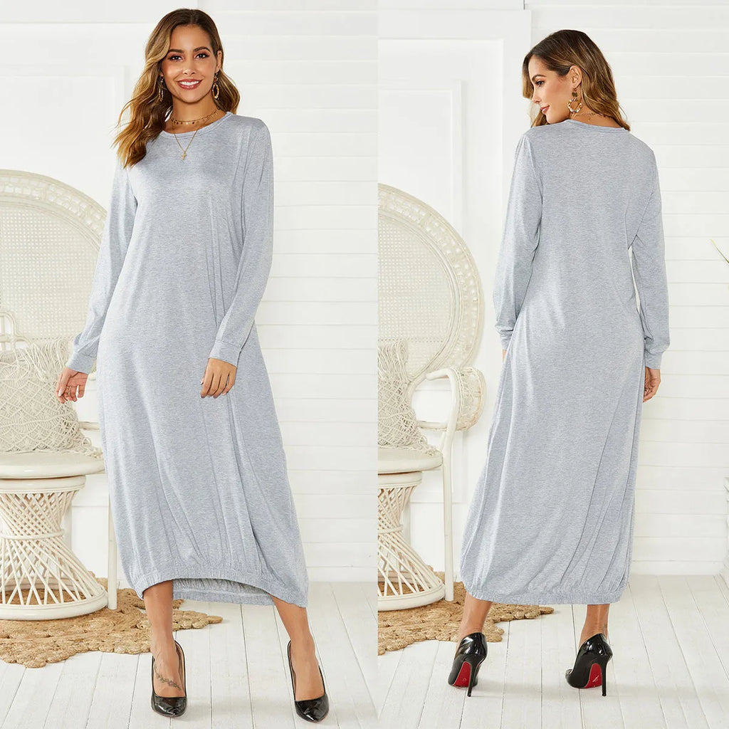 Black lace-up crew neck lantern dress with adjustable front lacing and loose fit, made from knitted polyester.