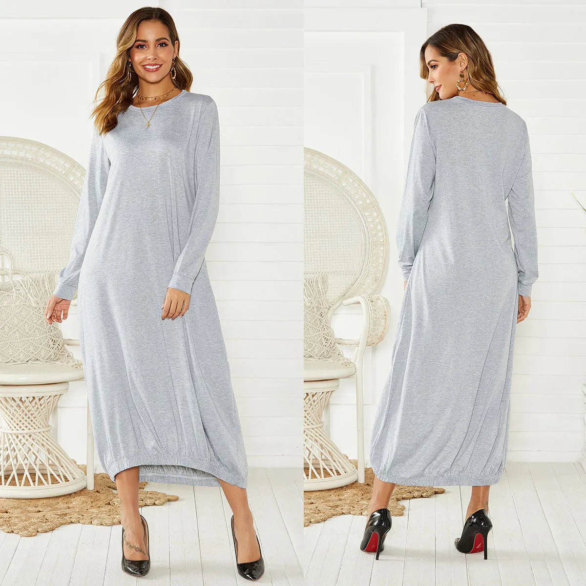 Black lace-up crew neck lantern dress with adjustable front lacing and loose fit, made from knitted polyester.