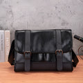 Black Korean-style men's anti-theft backpack made from PU material.