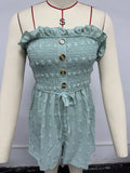 Women's blue off-shoulder sleeveless jumpsuit with button detail and mid-waist design on mannequin