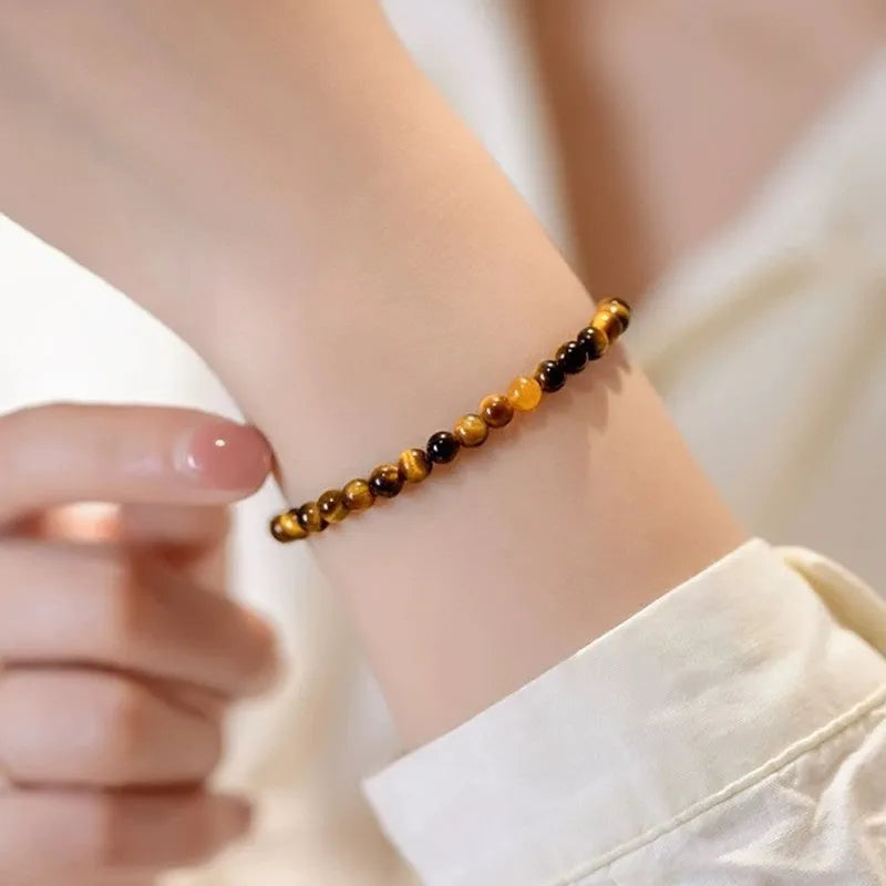 Handmade tigereye stone bracelet with geometric design and round elements in new Chinese style