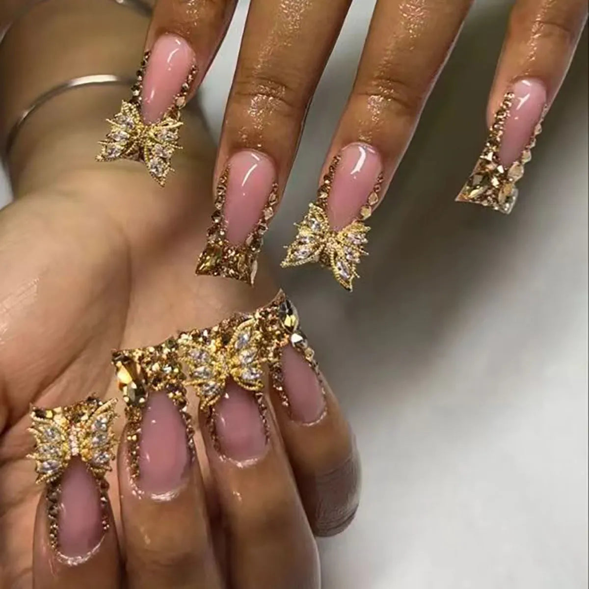 Golden diamond debris butterfly nail stickers set with jelly glue adhesive in D34 colour