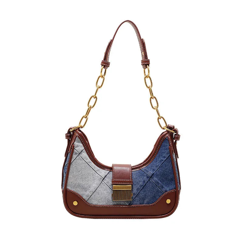 Brown denim women's bucket shoulder bag with diamond mesh detail, chain accents, and double adjustable straps