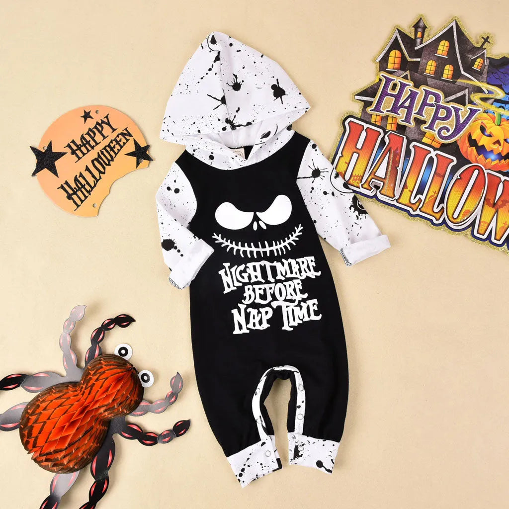 A black hooded Halloween romper costume with long sleeves for a child.