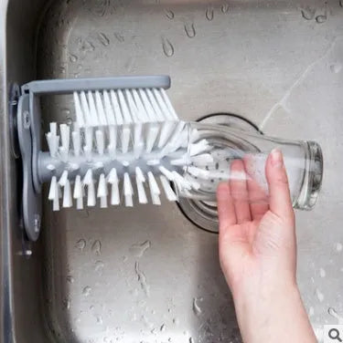 Grey rotating double-head cup cleaning brush with suction cups for wall mounting