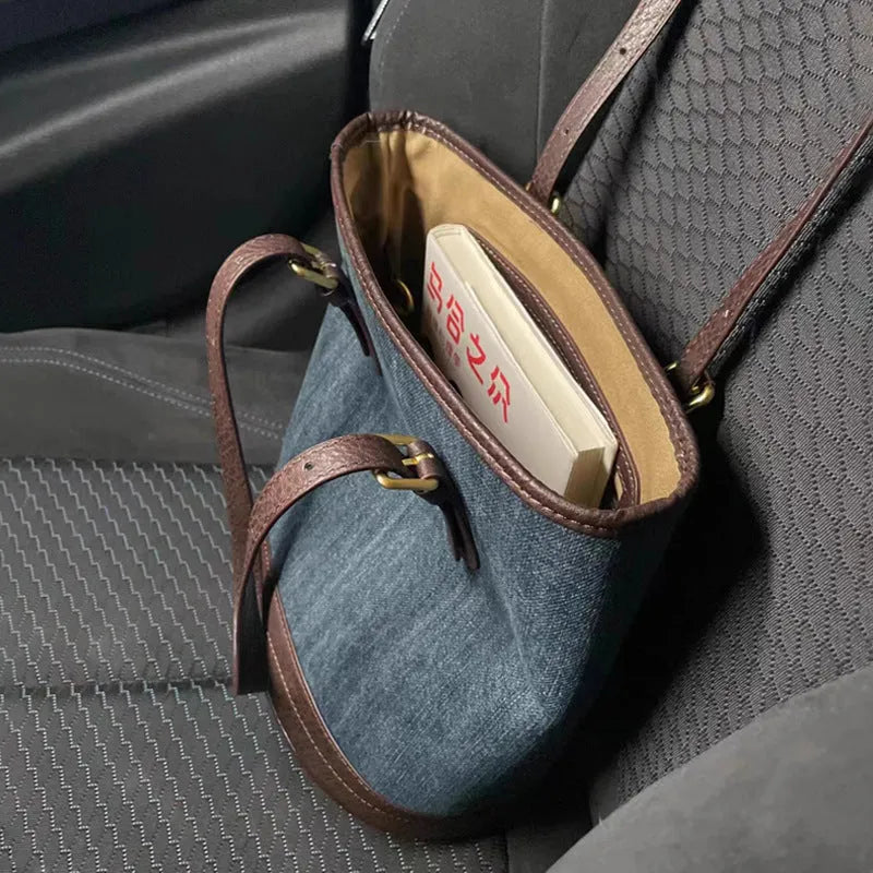 Denim patchwork retro one-shoulder bucket handbag showing large capacity and polyester construction