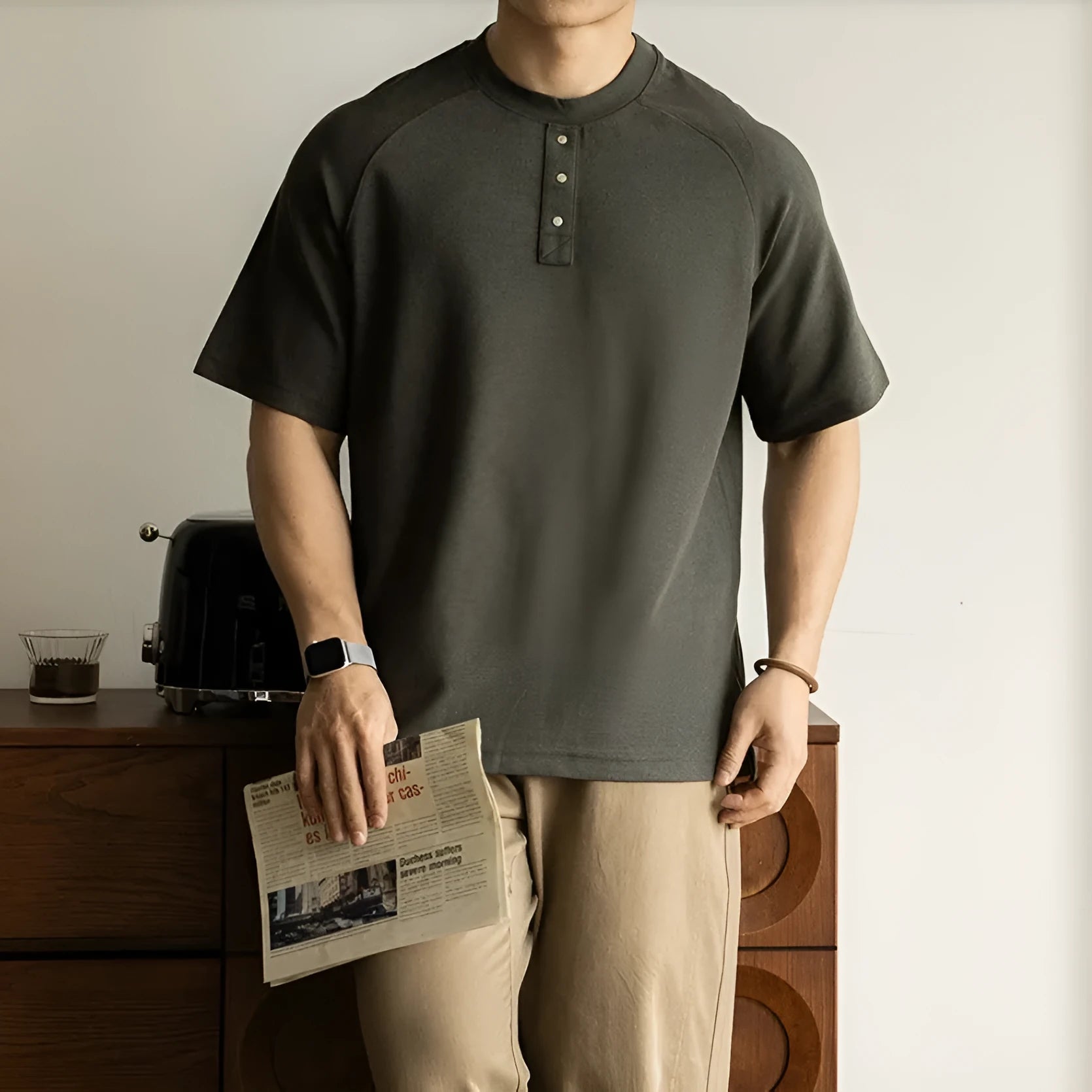 Casual pullover top with raglan sleeves in terry texture fabric showing loose fit and colour options