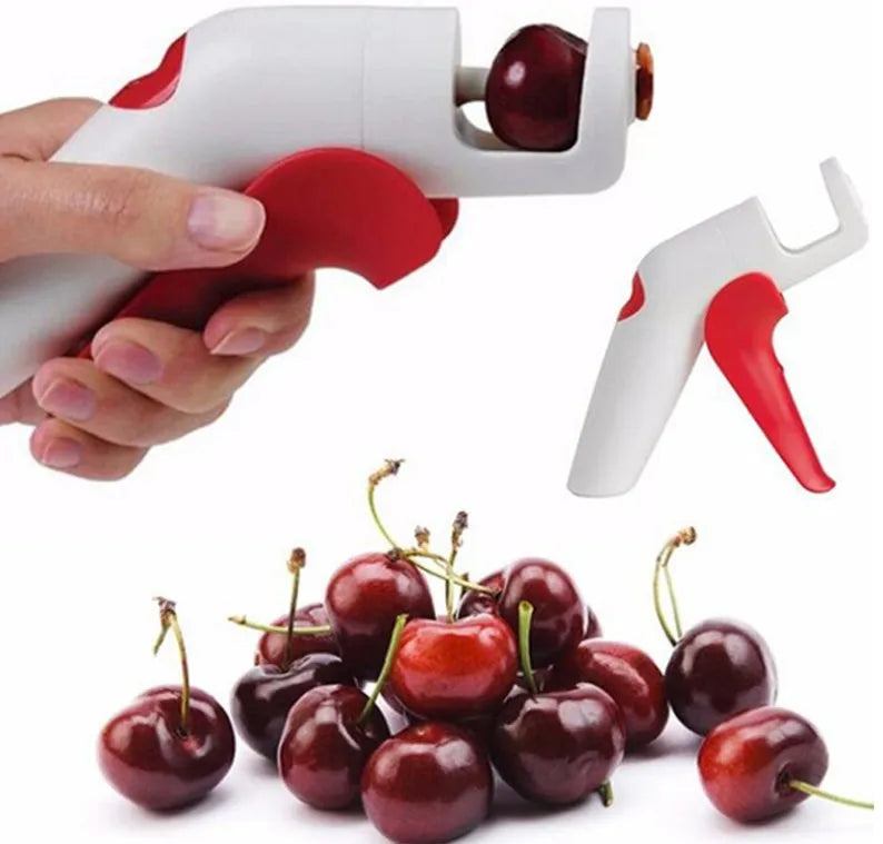 Stainless steel cherry kernel remover with 2.5cm plunger and 15cm handle on kitchen surface