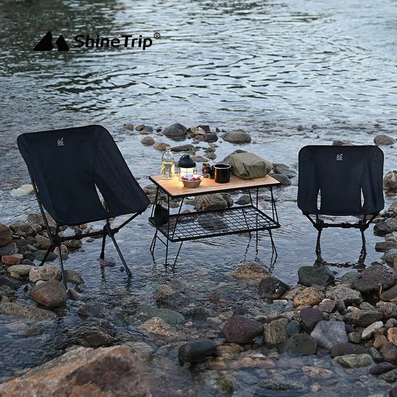 Aluminium alloy folding moon chair in army green, shown in a folded and unfolded state.