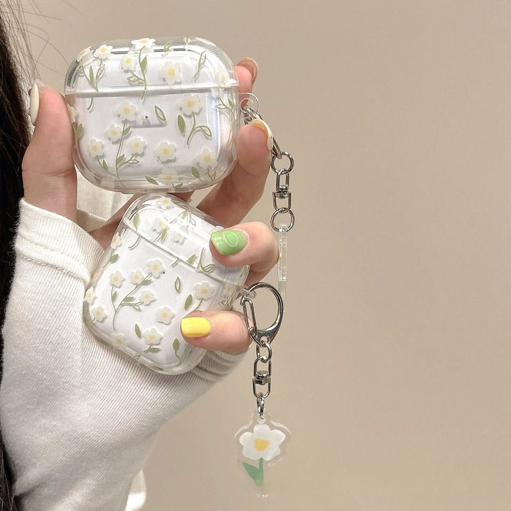 White floral design AirPods protective cover showing high-transparency TPU material and decorative elements