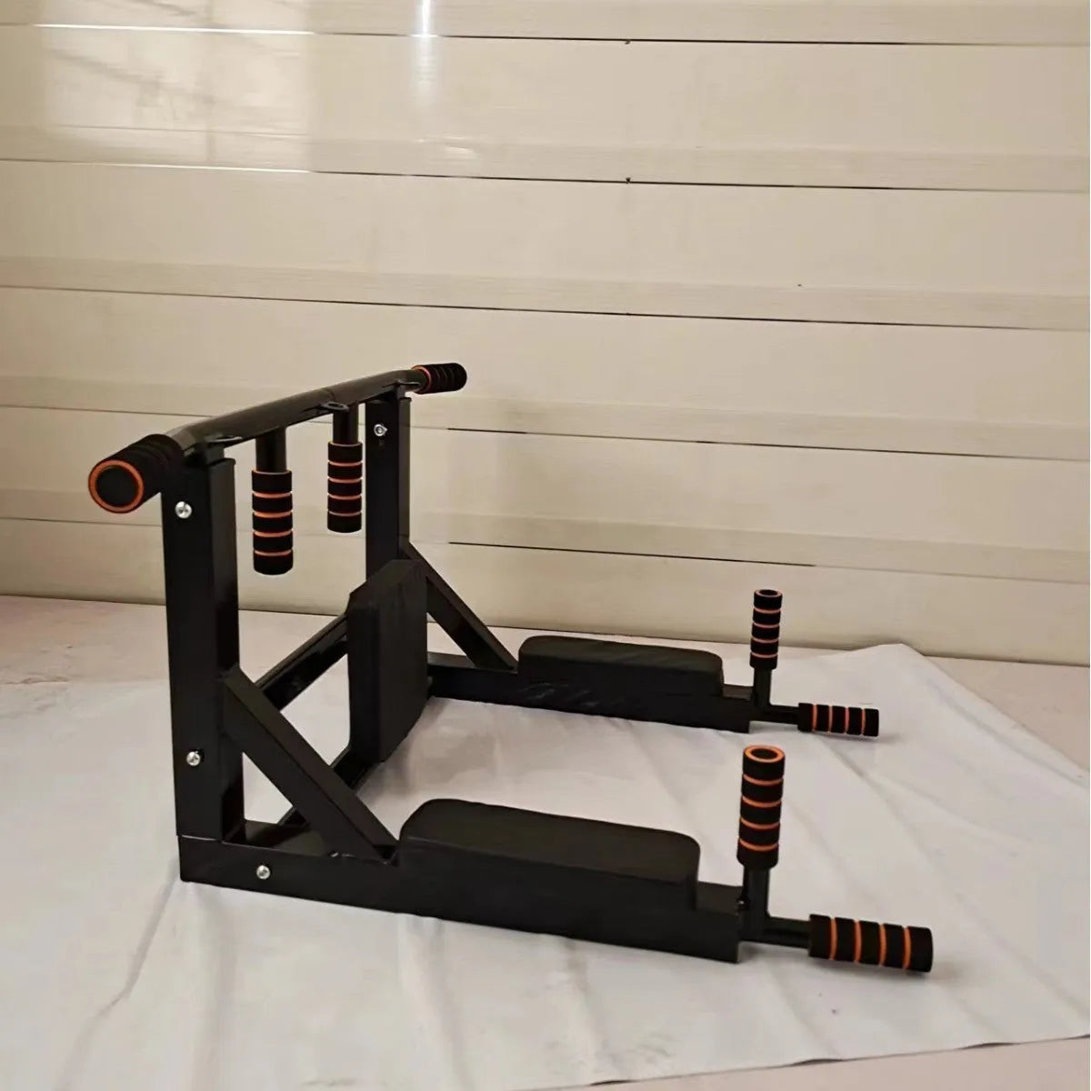 Black wall-mounted fitness rack with parallel bars for pull-ups, dimensions 77cm by 47cm