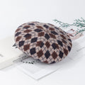 Wool plaid beret with adjustable fit, dome crown, tassel and mesh detail, in blue light coffee plaid.