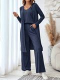Women's blue polyester casual suit set with trousers, long sleeve top, and suspenders on hanger