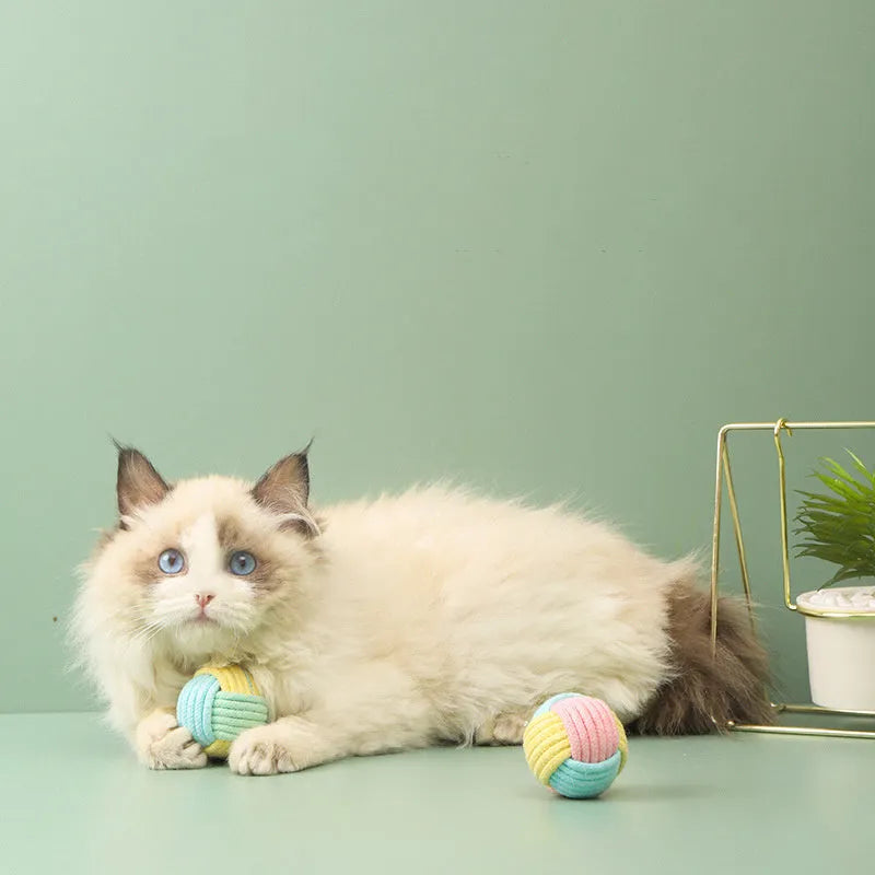Handmade blue powder, green blue, and pink green cat hair ball plush toys for interactive play