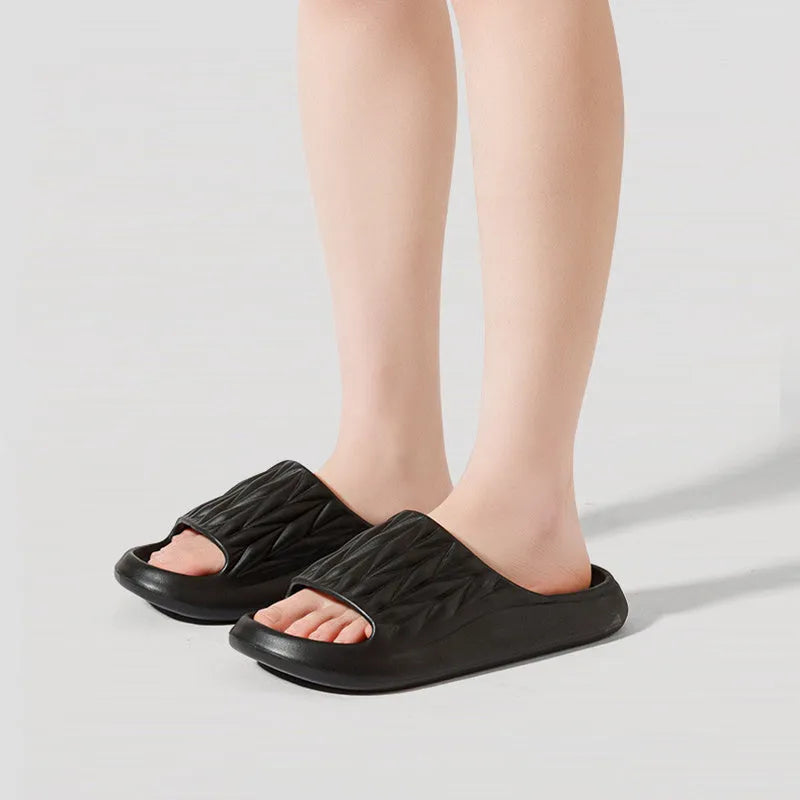 Leaf texture pattern EVA slippers showing moulded sole design for indoor non-slip use