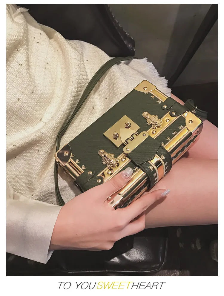 Women's hard PU shoulder bag with flap closure and single strap in black or green, showing rivet decoration