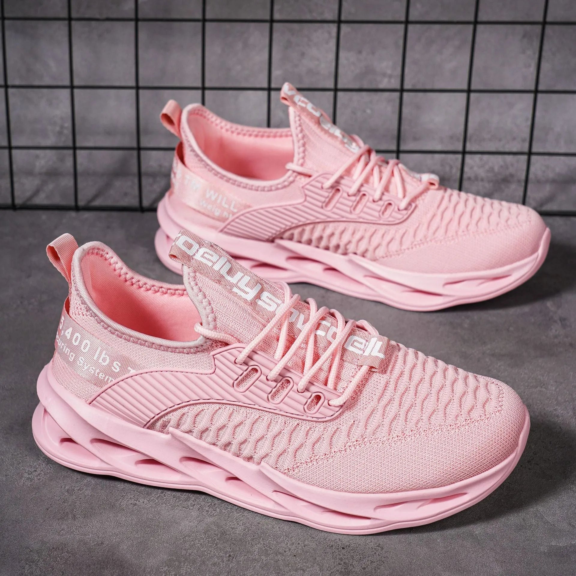 Women's FlyKnit casual sports shoes in breathable mesh, available in multiple colours with a flat heel and round toe.