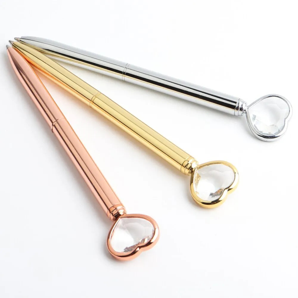 Golden Love Ball Crystal Diamond Metal Pen on a white background.