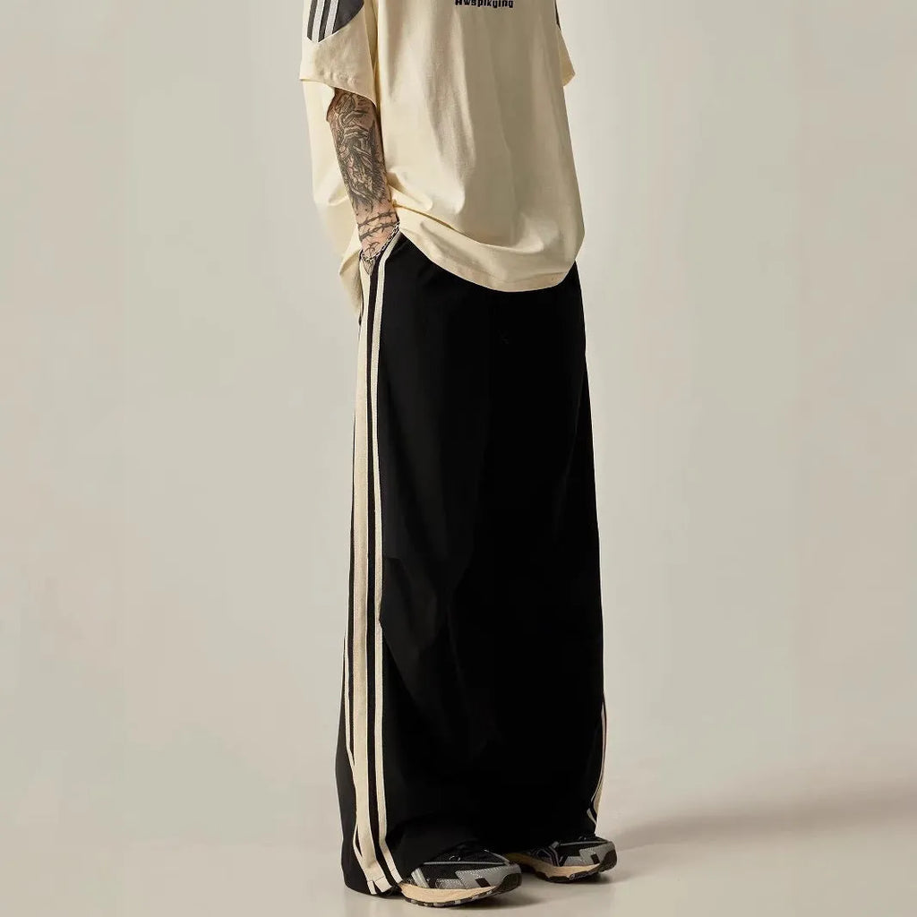 Men's black climbing trousers with wide-leg design and high-waist fit for summer leisure activities