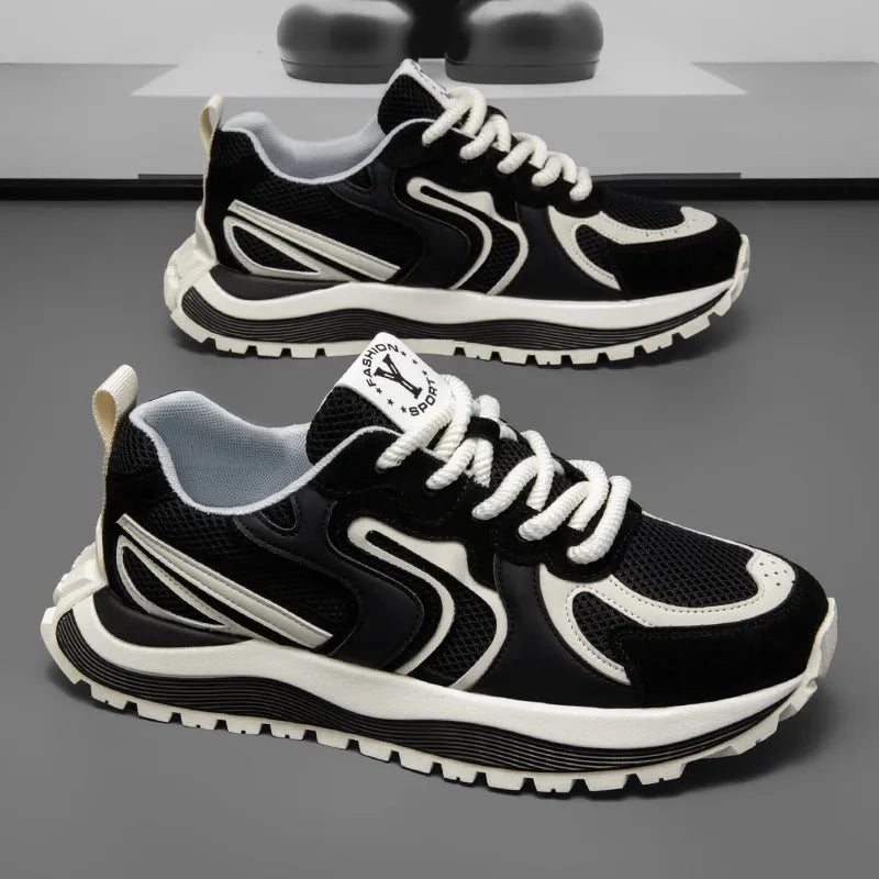 Men's round-toe sneakers in yellow with mesh panels and white laces on a rubber sole.