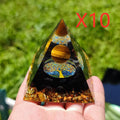 6cm crystal epoxy pyramid decoration with natural gravel visible through transparent resin in Lapis lazuli blue colour