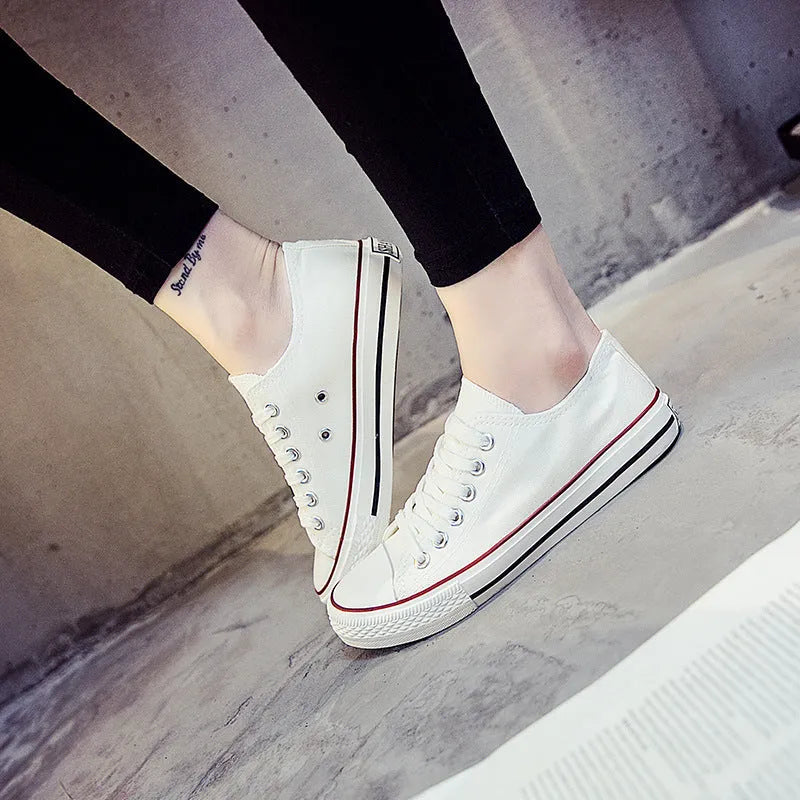 Women's canvas shoes in solid colours with canvas upper, sizes 35-44, on a neutral background.