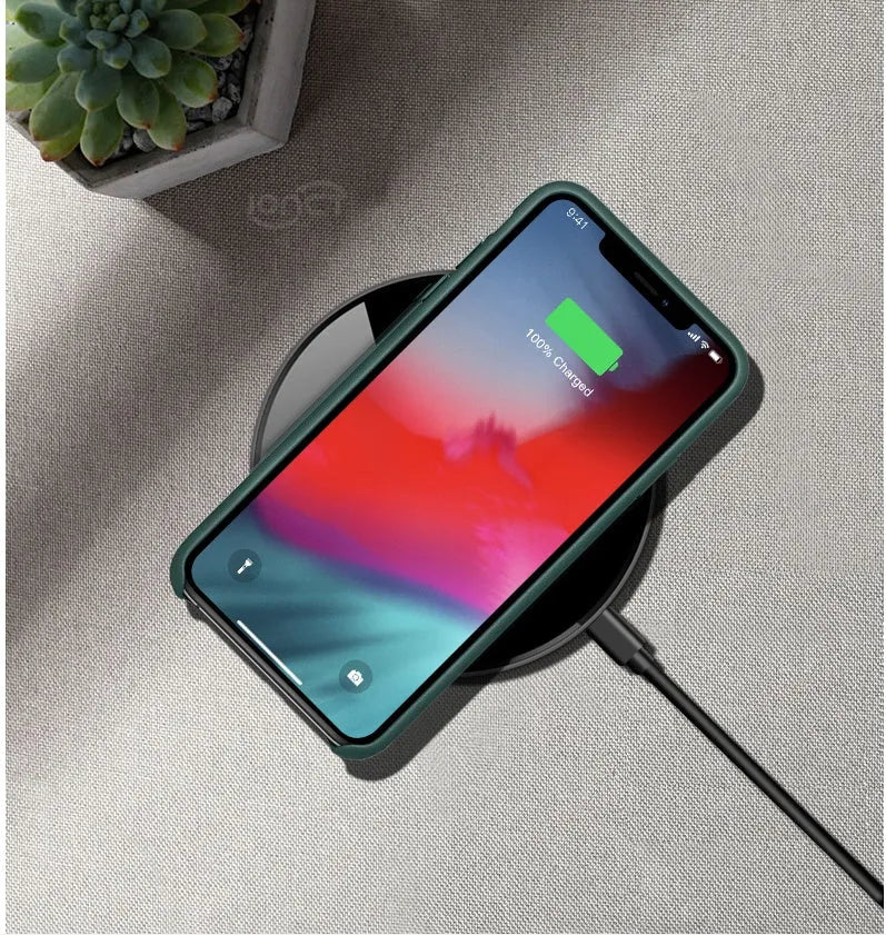 Black 15W QI wireless charger with foreign object detection for charging through phone cases
