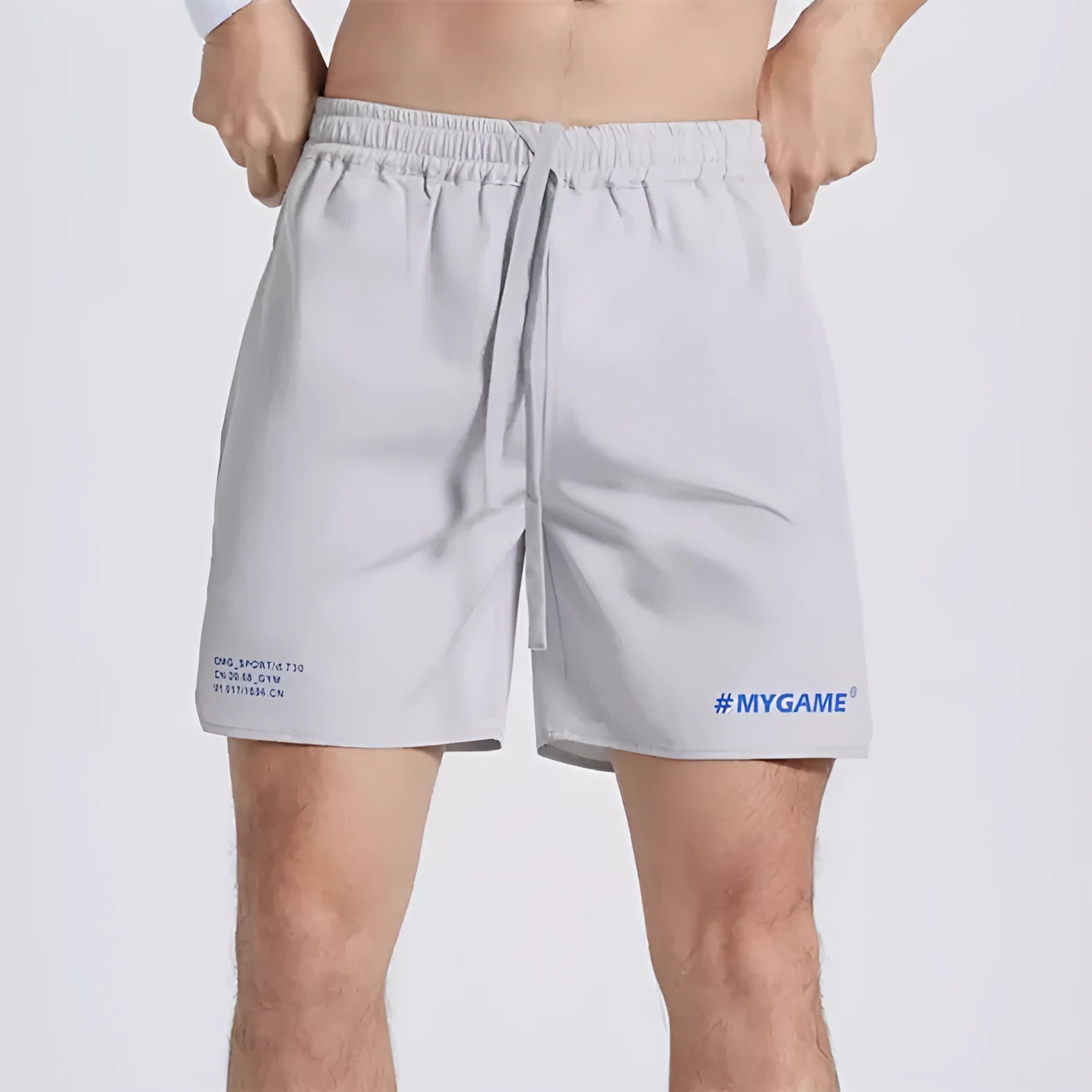 Men's midnight blue training fitness shorts with moisture-wicking fabric on a gym background.