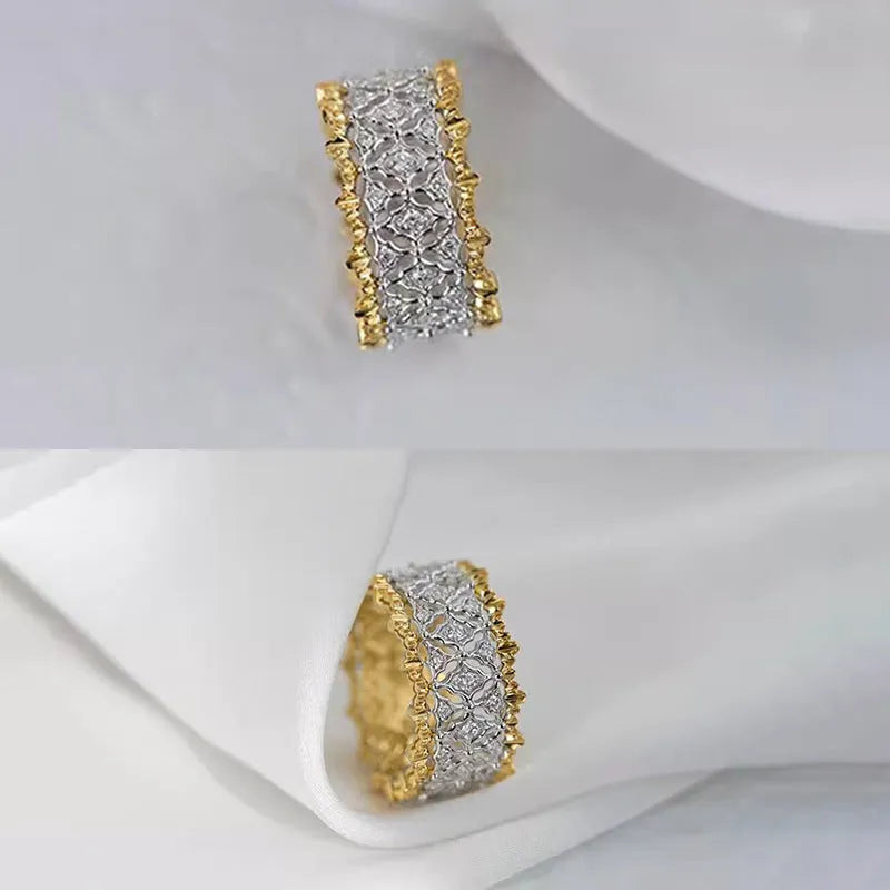 Geometric two-tone zircon ring on finger showing copper construction with electroplated finish and round stone