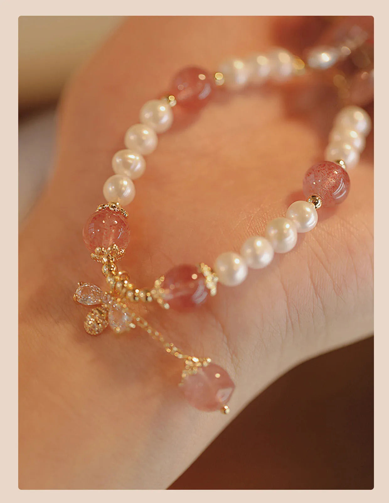INS style women's bracelet with strawberry quartz stringed pearls and a central bow detail