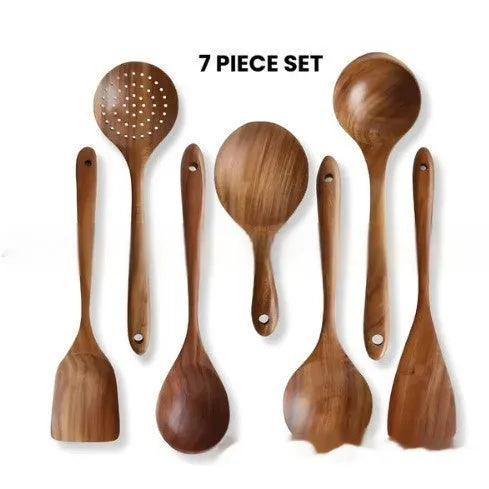 7-piece wooden kitchen utensil set showing spoons and spatulas with solid wood construction