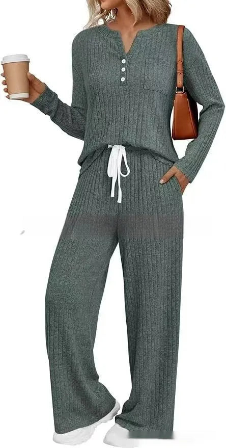 Women's knitted V-neck long coat with striped pattern and matching trousers in apricot colour