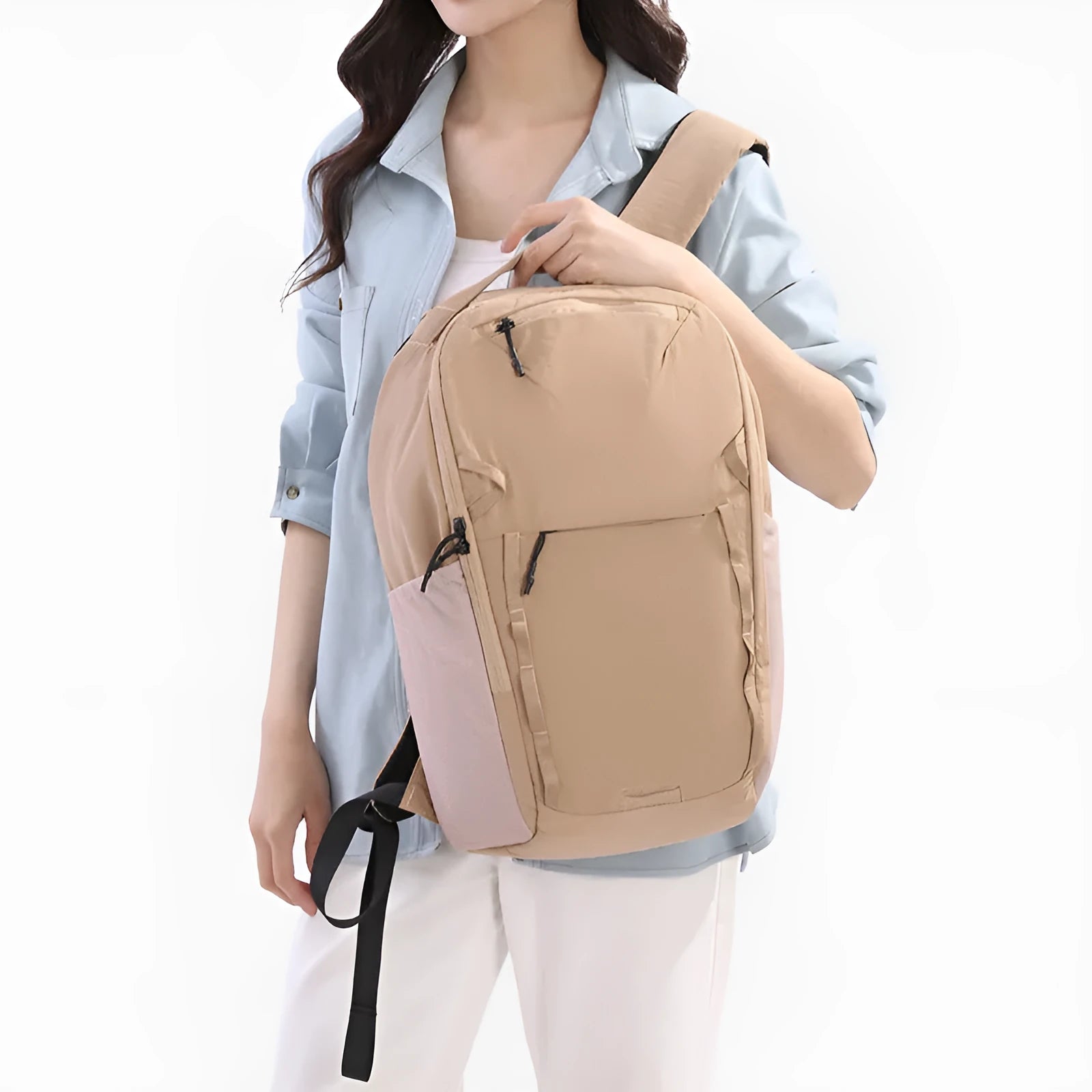 Waterproof Taslan composite cloth backpack in beige with a curved shoulder strap.