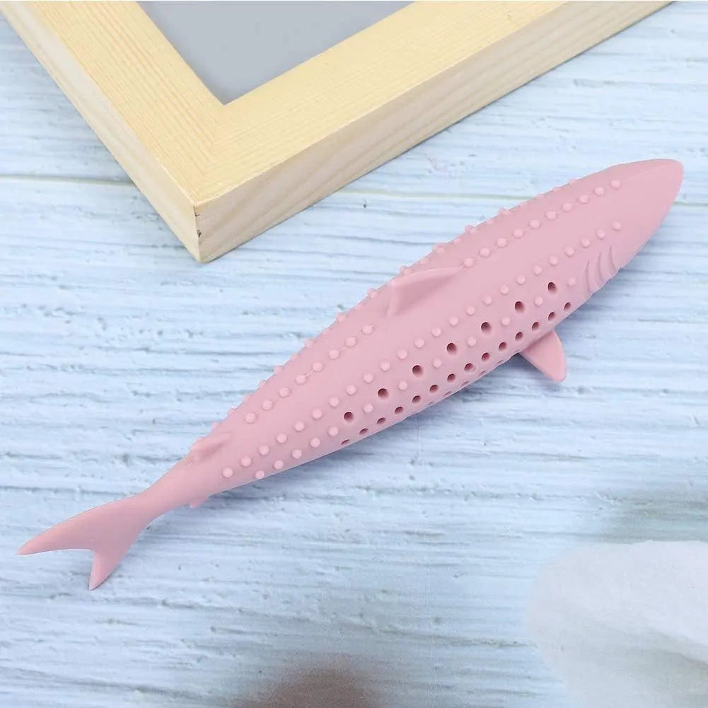 Green dolphin-shaped silicone cat chew toy with breathable side holes for catnip scent release