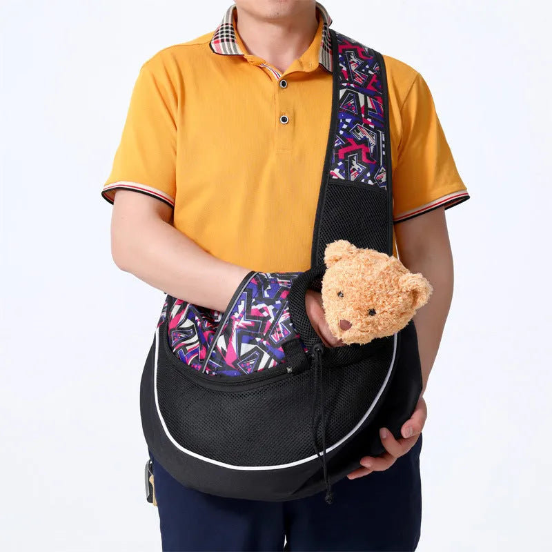 Oxford cloth crossbody pet bag for small dogs and cats, sizes S and M, with drawstring and bottom zipper, shown in black, blue, green, orange, or purple.