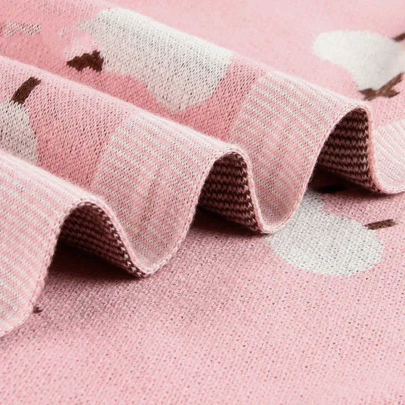 Pink and grey baby sheepskin blanket wind covers measuring 100cm by 80cm