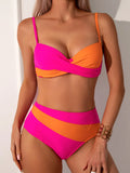 Orange women's bikini set with underwire bra and briefs on a mannequin
