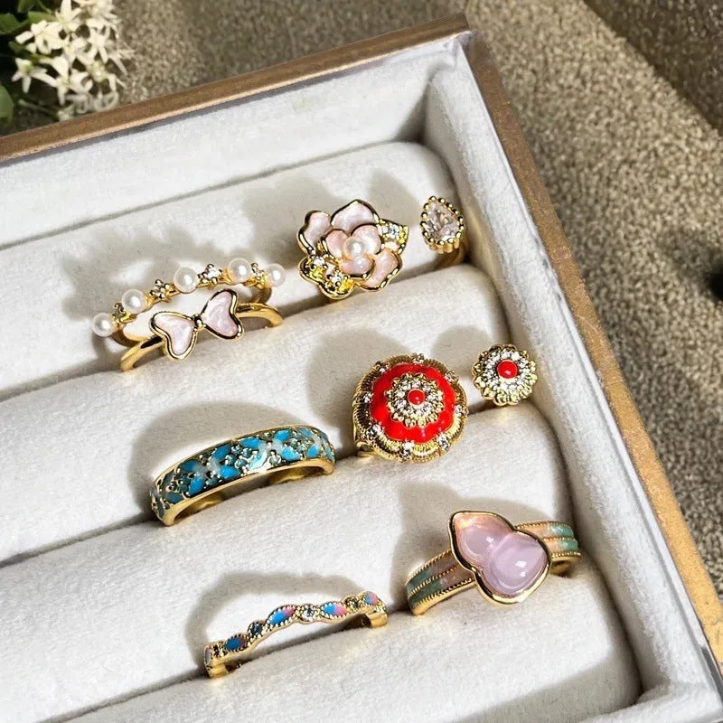 Adjustable copper ring with vintage oil-dripping gourd design, inlaid zircon stones, and flower and bow shapes in New Chinese style