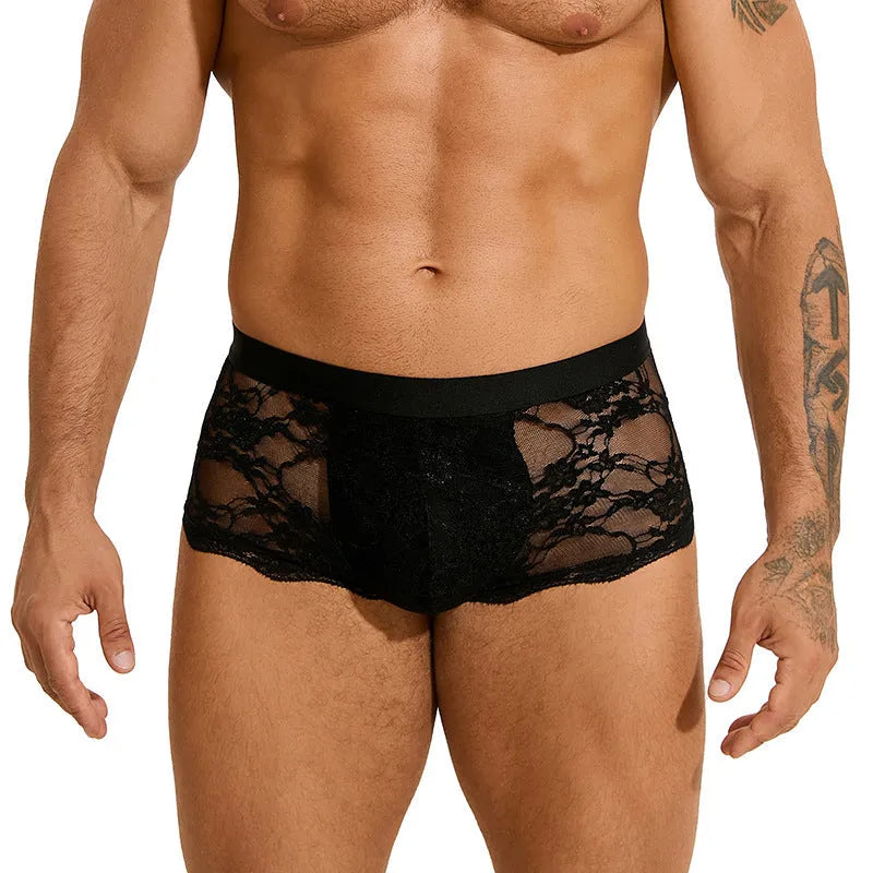 Men's black lace briefs with hollow-out see through design showing transparent construction