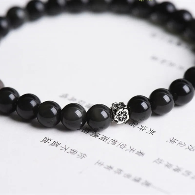 Natural obsidian and S925 silver bracelet with dragon phoenix constellation decorations.
