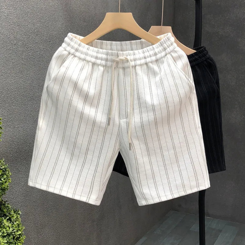 Men's black and white striped casual shorts with fleece lining, double-layer waistband, and ankle banding on straight-leg design