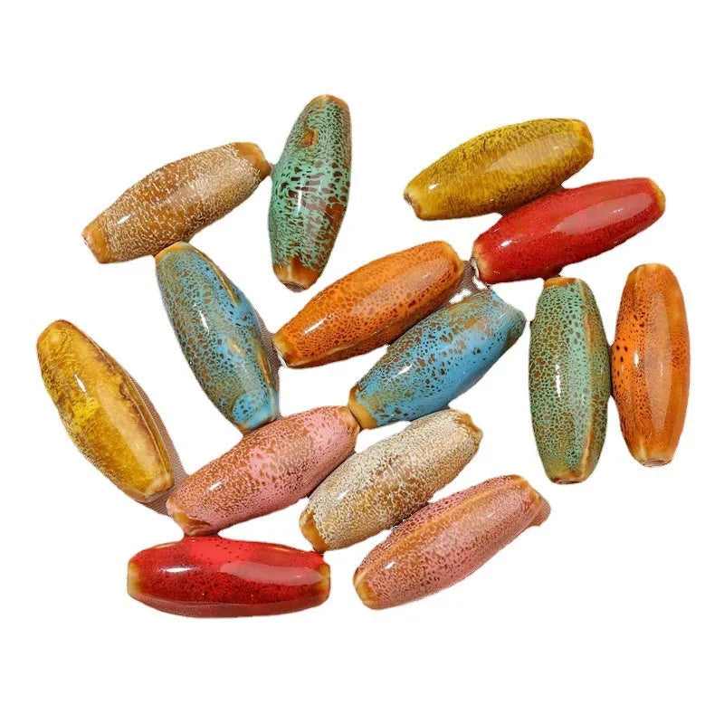Ceramic jewellery making beads in eight colours including pink, yellow, blue, red, coffee, green, orange and mixed